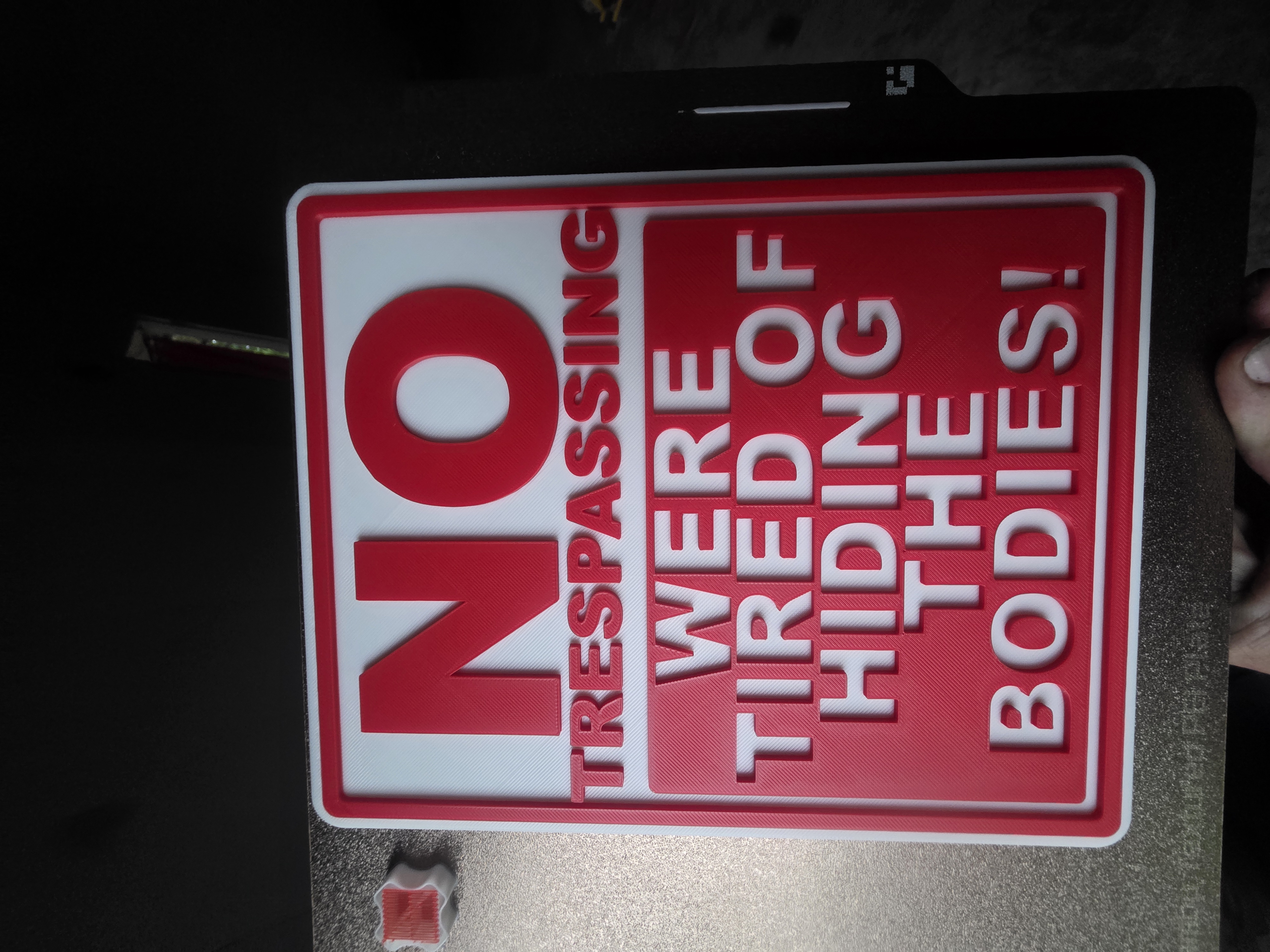 Layered No Trespassing Sign